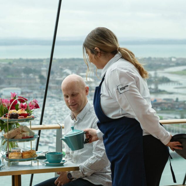 High Tea Waitress Pouring Tea 634X634